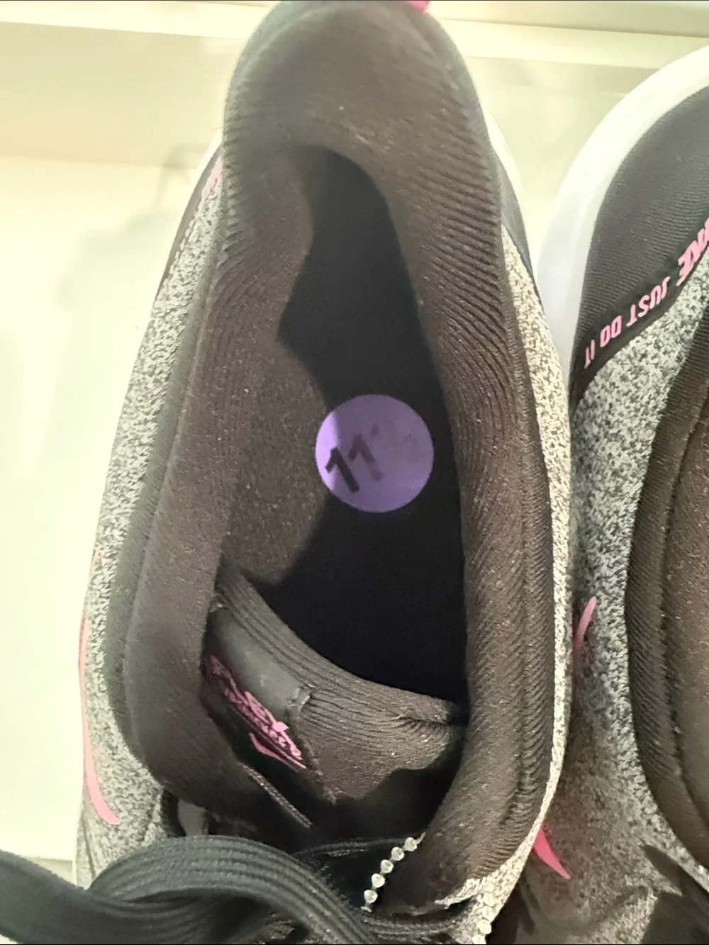 Nike Women's Gray Athletic Sneakers with Pink Swoosh
